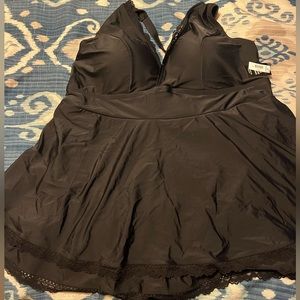 One piece dress style bathing suit plus size from Torrid.